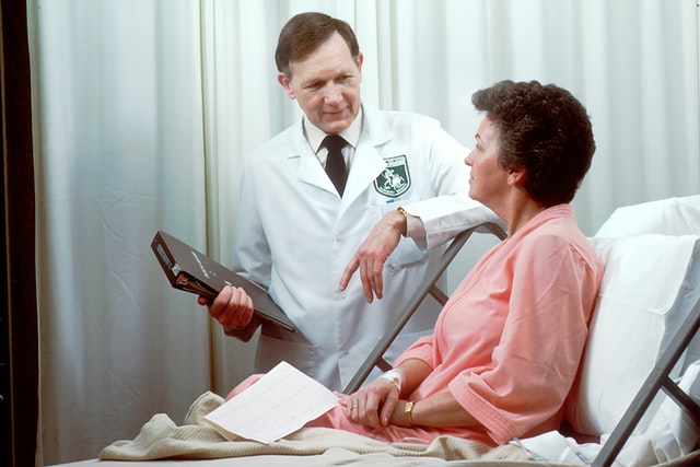 doctor talking with patient